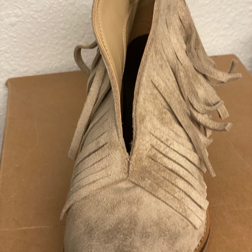 Brand new never worn bootie with fringe size 8. Original box! Super cute.